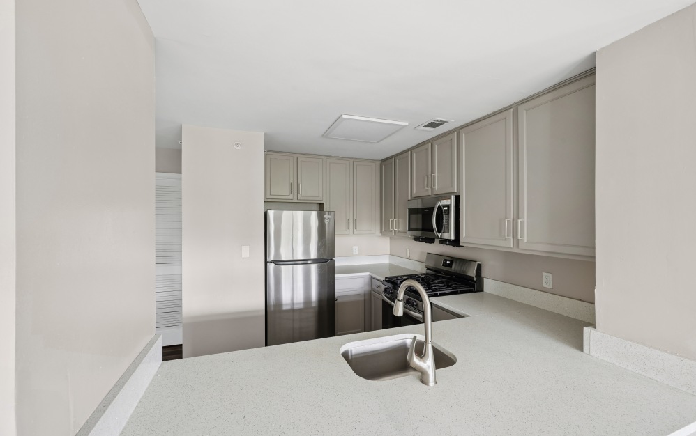 B1 - 2 bedroom floorplan layout with 1 bathroom and 893 square feet (Kitchen)