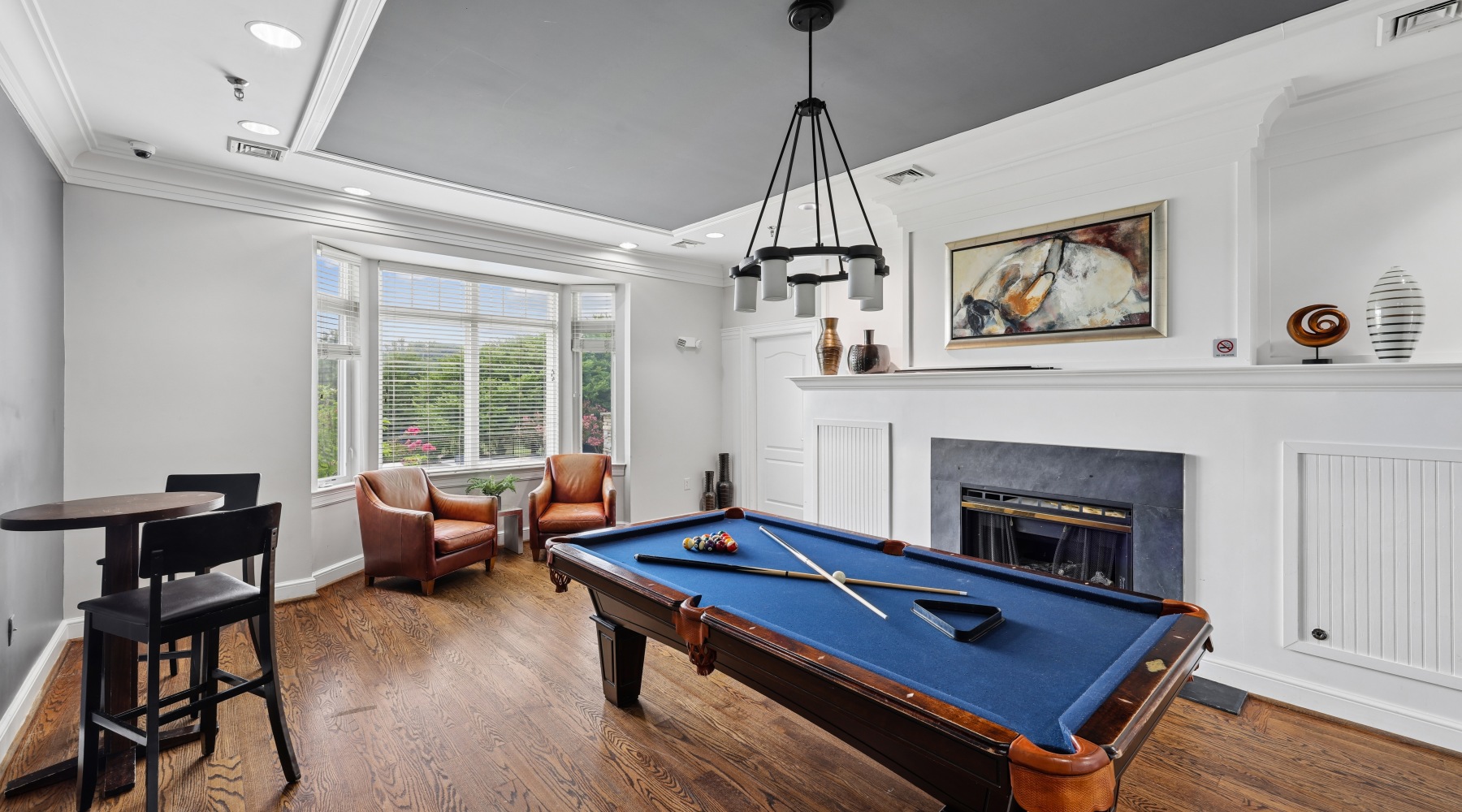Pool table room with lounge seating